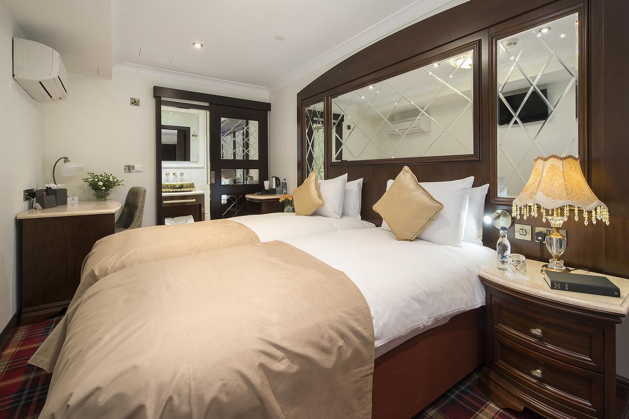 The George Street Hotel Oxford Exterior foto A bedroom at the hotel